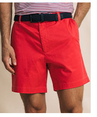 Man in red shorts.