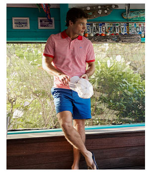 Man in red and white striped polo.