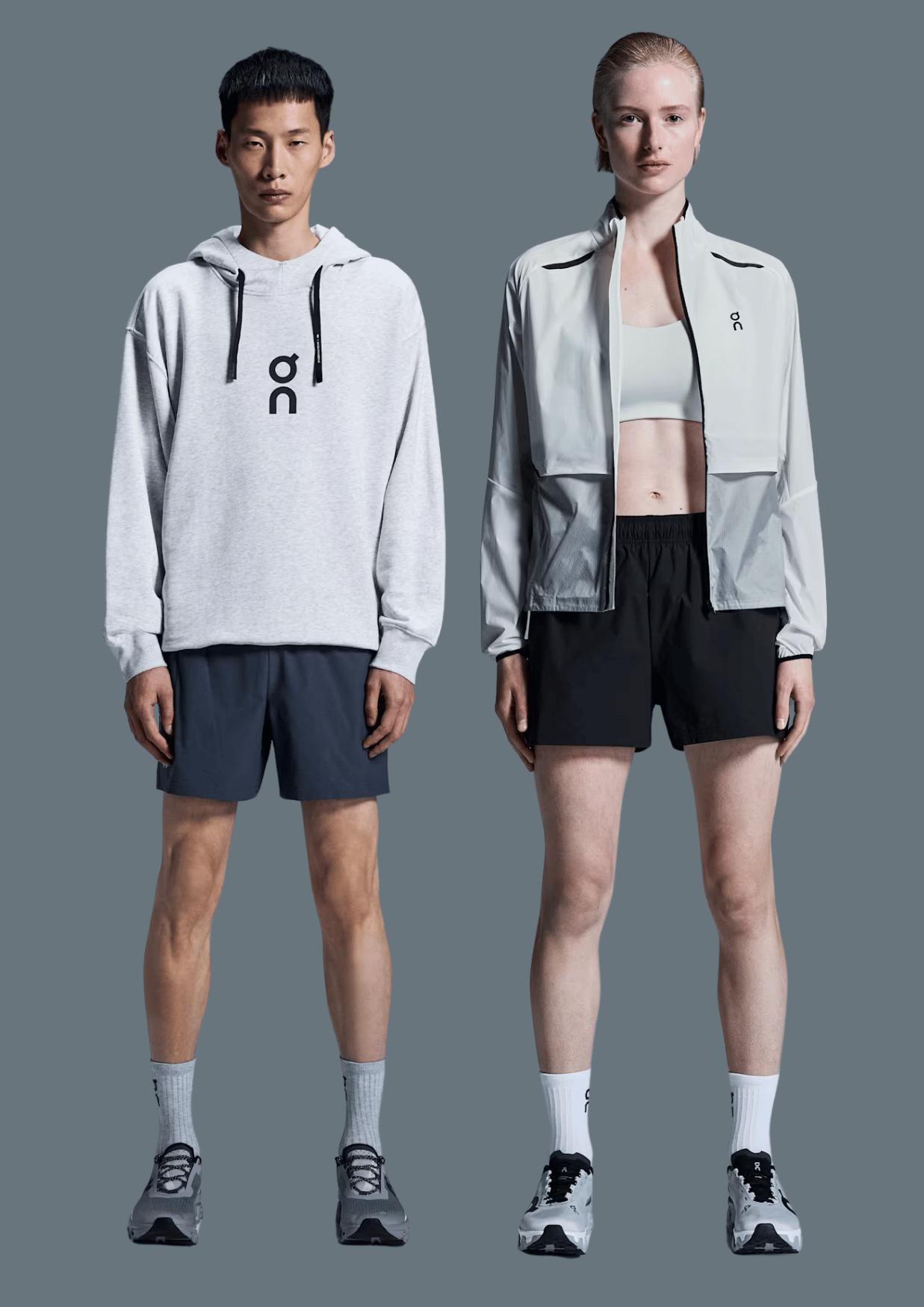 two men in shorts and a sweatshirt and a hoodie