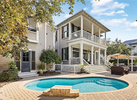 Escape to a serene vacation rental with swaying palms in Santa Rosa Beach, Florida.