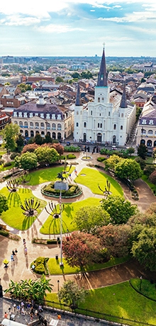 Jackson Square in New Orleans features St. Louis Cathedral overlooking a landscaped park.