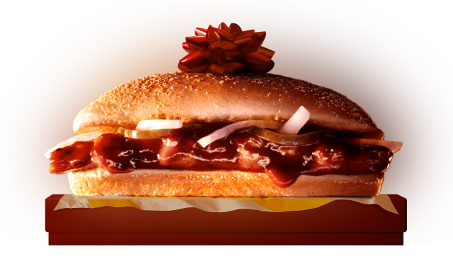 McRib sandwich with a red bow on top.