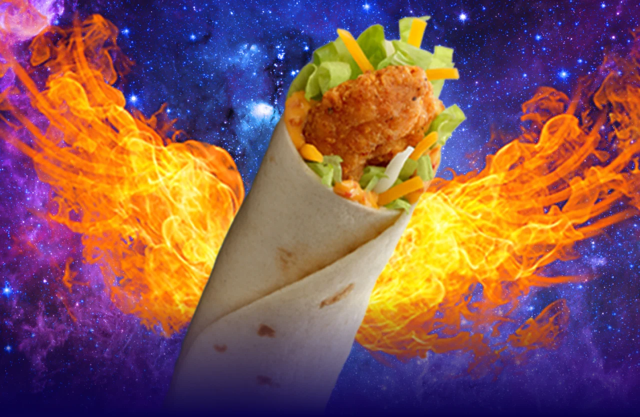 Snack Wrap triumphantly soars back to McDonald's with phoenix wings burning brightly behind it.