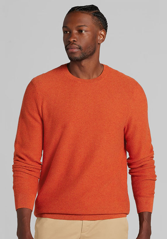 Man with orange sweater