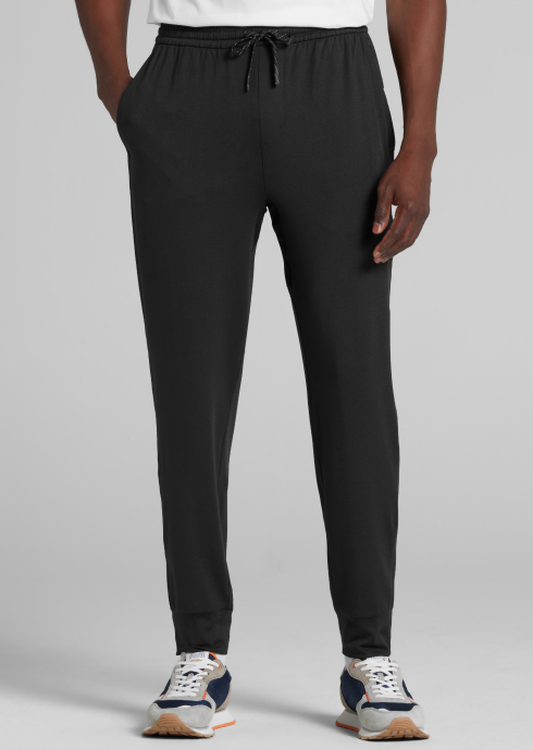 black jogger pants paired with sneakers