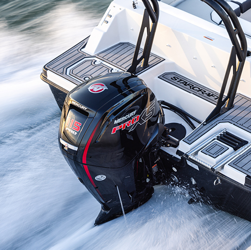 A Mercury Pro XS 115 outboard motor propels a Starcraft boat through the water.