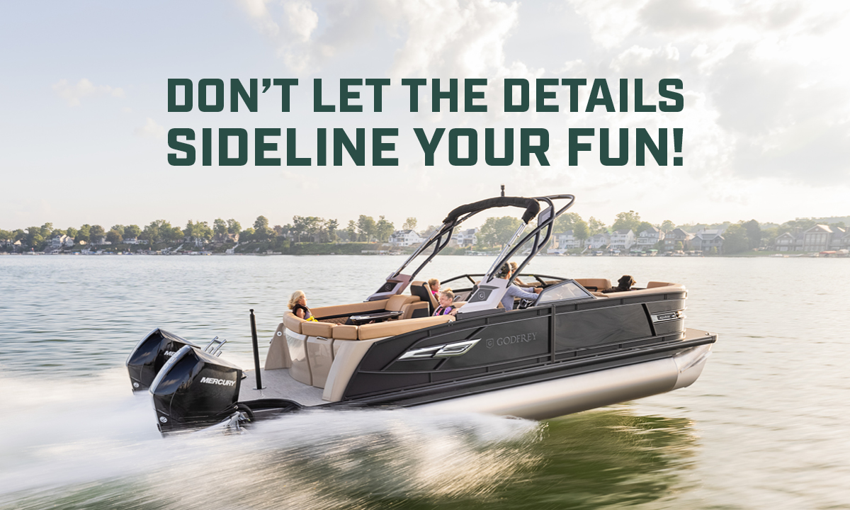 A Godfrey pontoon boat speeds across the lake, its wake trailing behind. The boat is filled with people enjoying the ride. Text overlay: Don't let the details sideline your fun!
