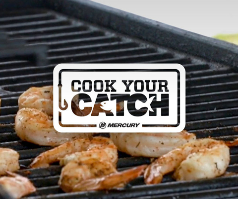 Shrimp cooking on a grill with the "Cook Your Catch" logo.
