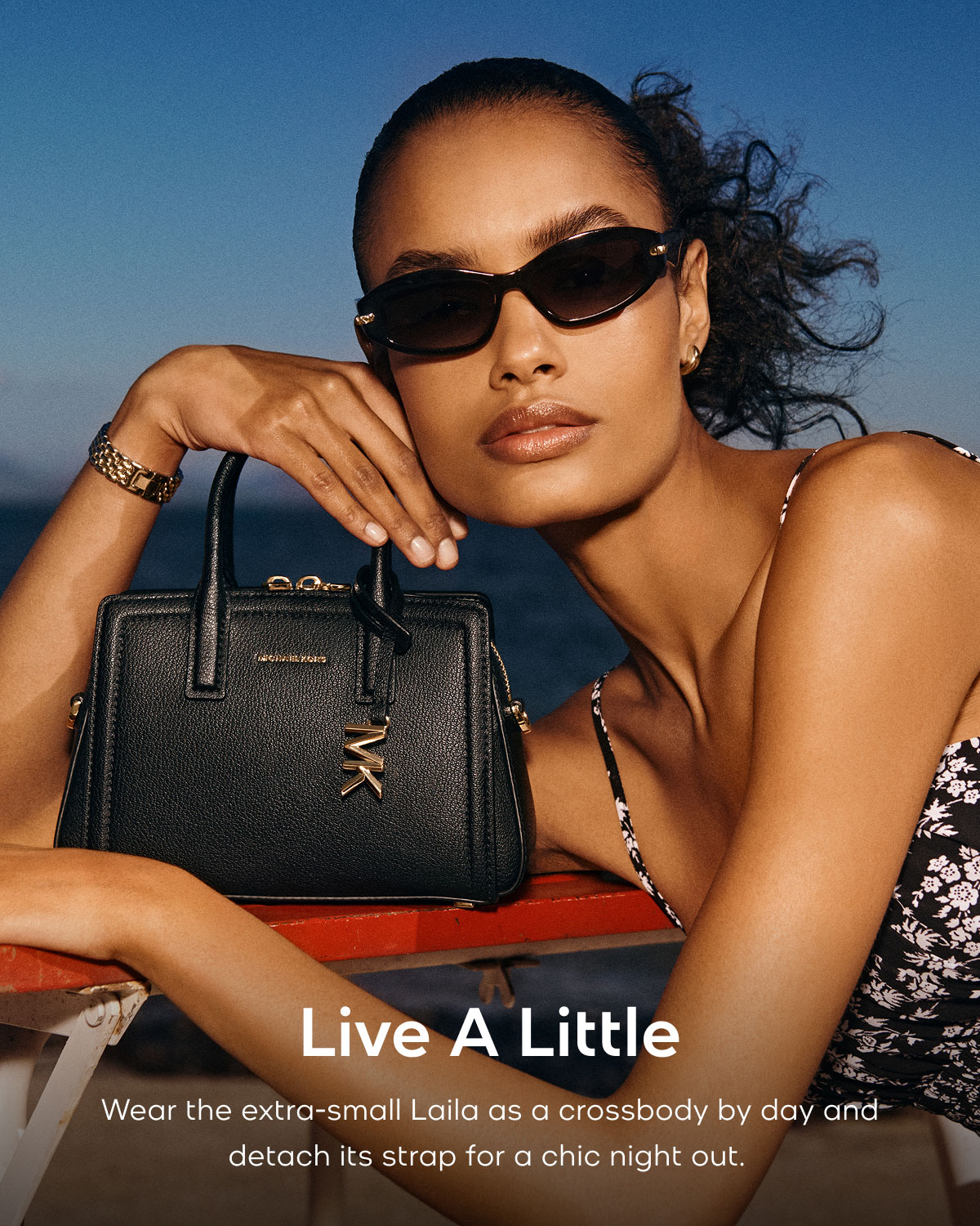 Live A Little Wear the extra-small Laila as a crossbody by day and detach its strap for a chic night out.