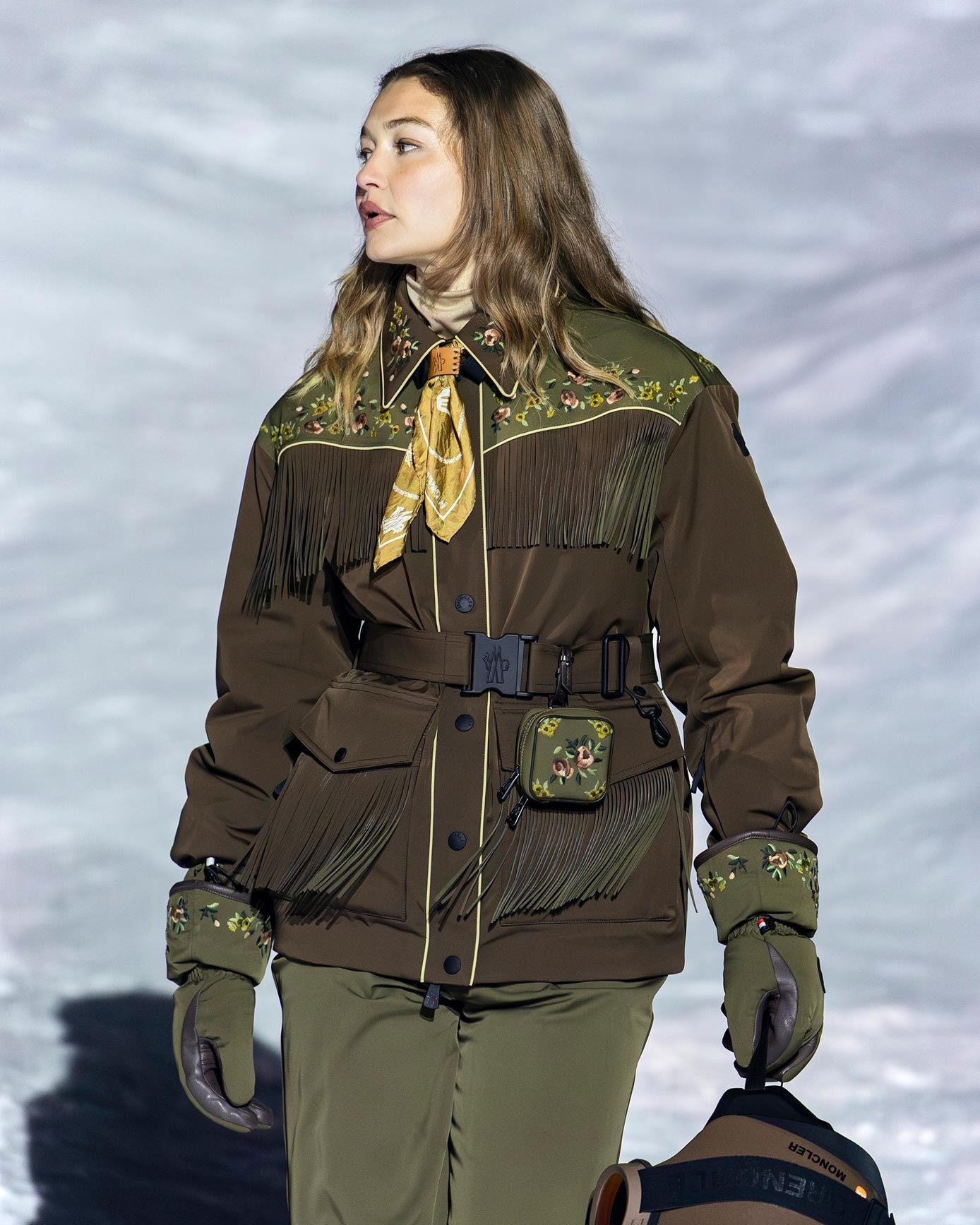  Shop now on Moncler's website