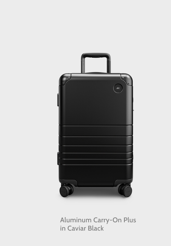 Aluminum Carry-On Plus in Caviar Black.