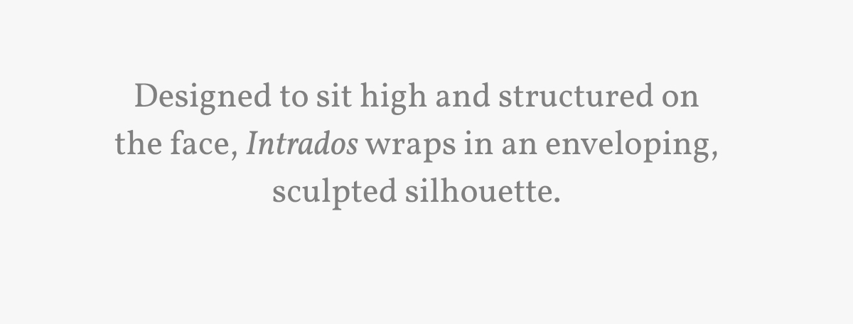 Designed to sit high and structured on the face, Intrados wraps in an enveloping, sculpted silhouette.