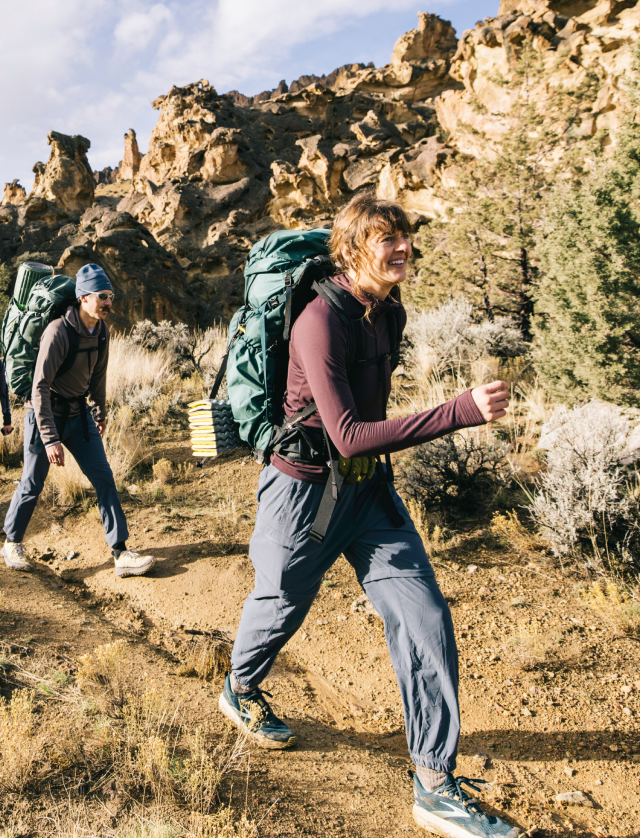 Backpackers wearing their Up First™ Tech Fleeces