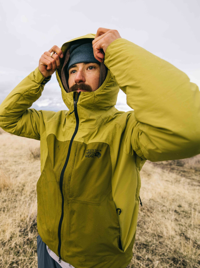 A camper wearing their Stretch Ozonic™ Insulated Jacket