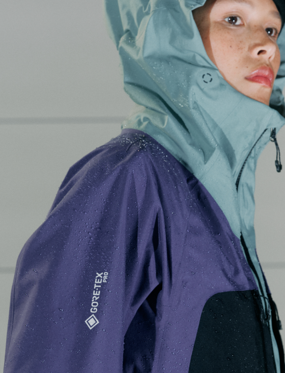 A model wearing the Women's Mythogen™ Gore-Tex Pro Kit