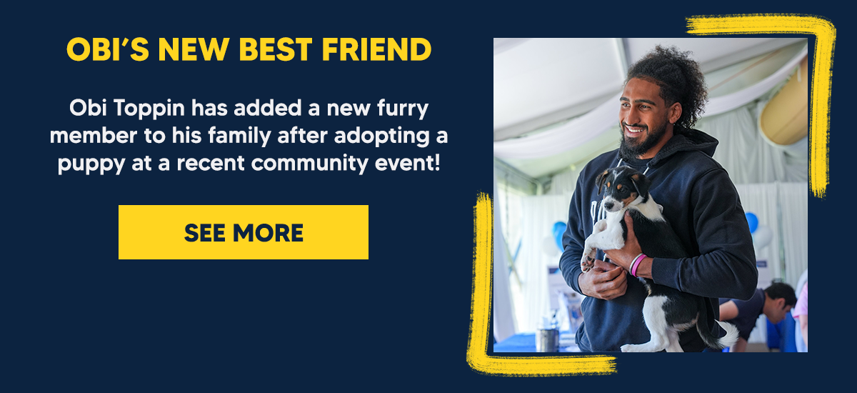 Obi Toppin has added a new furry member to his family after adopting a puppy at a recent community event!