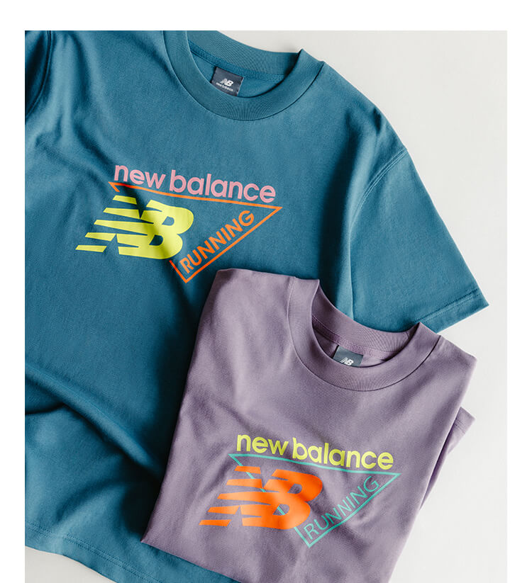 Two New Balance graphic tees laid flat.