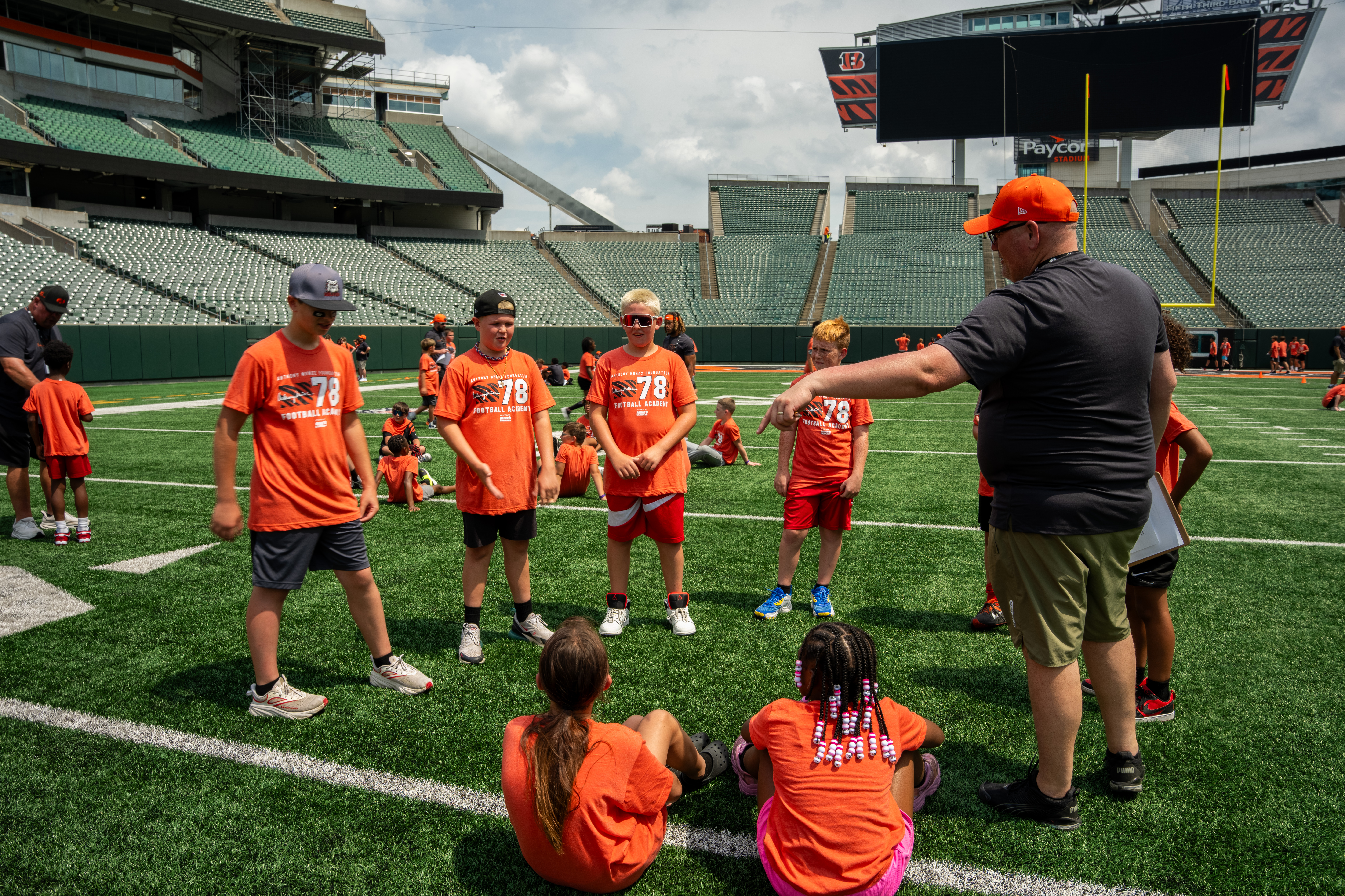 Local kids enjoying Anthony Munoz football academy.