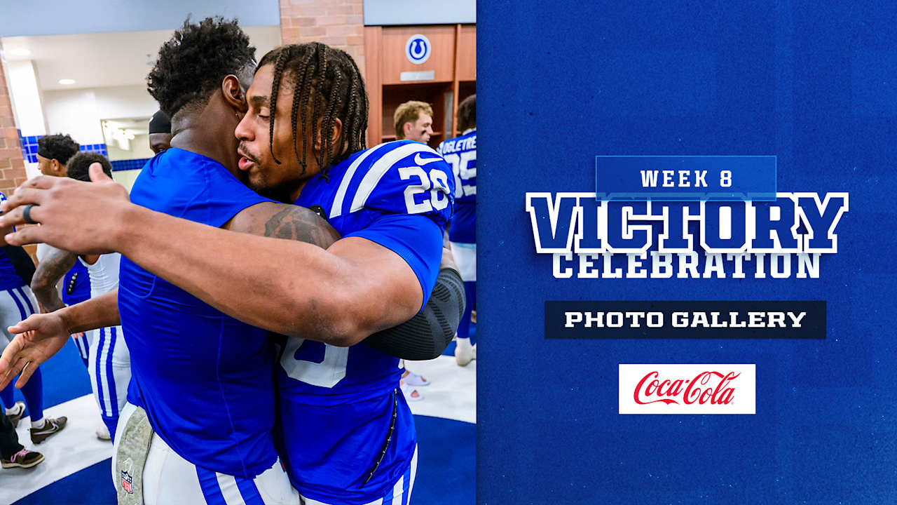 Tap to view the Week 8 victory celebration photo gallery.