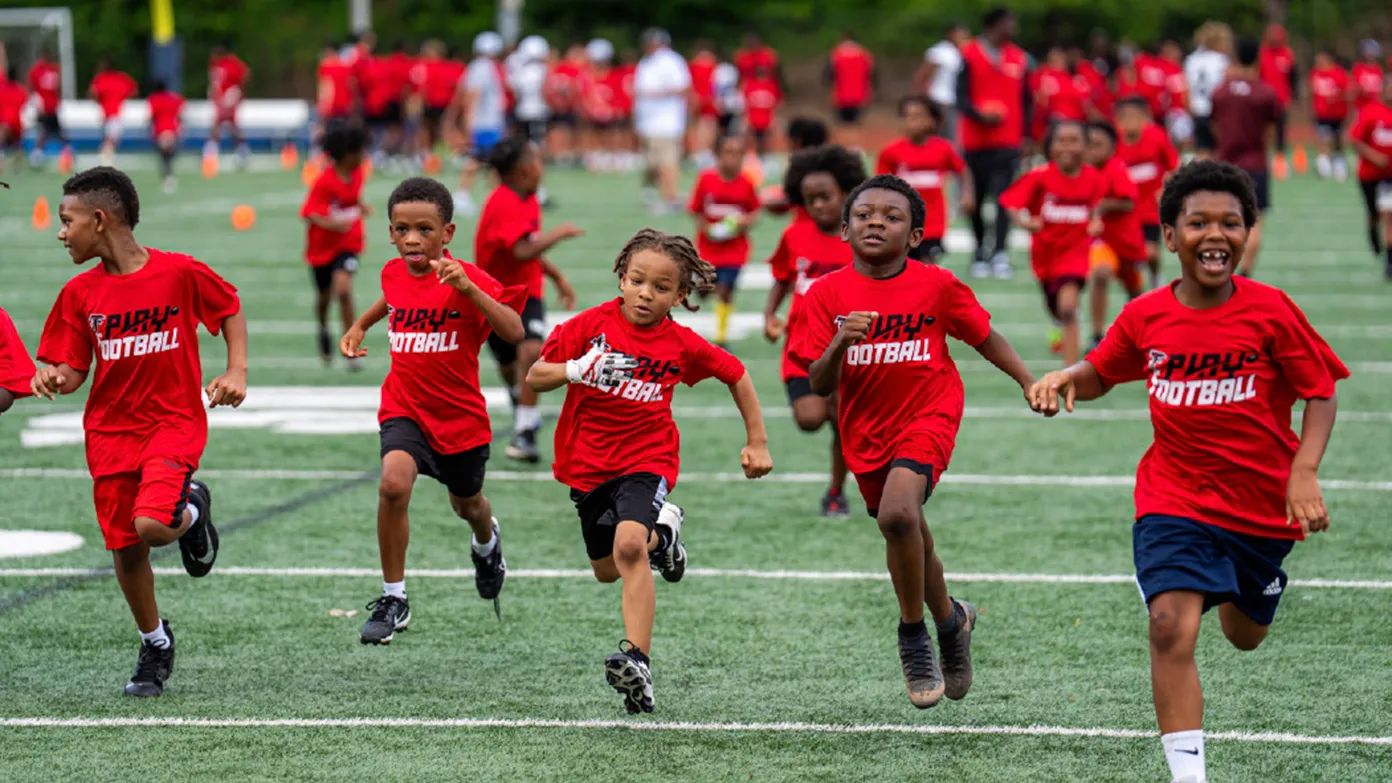 Youth athletes at the Atlanta Falcons Football Camp