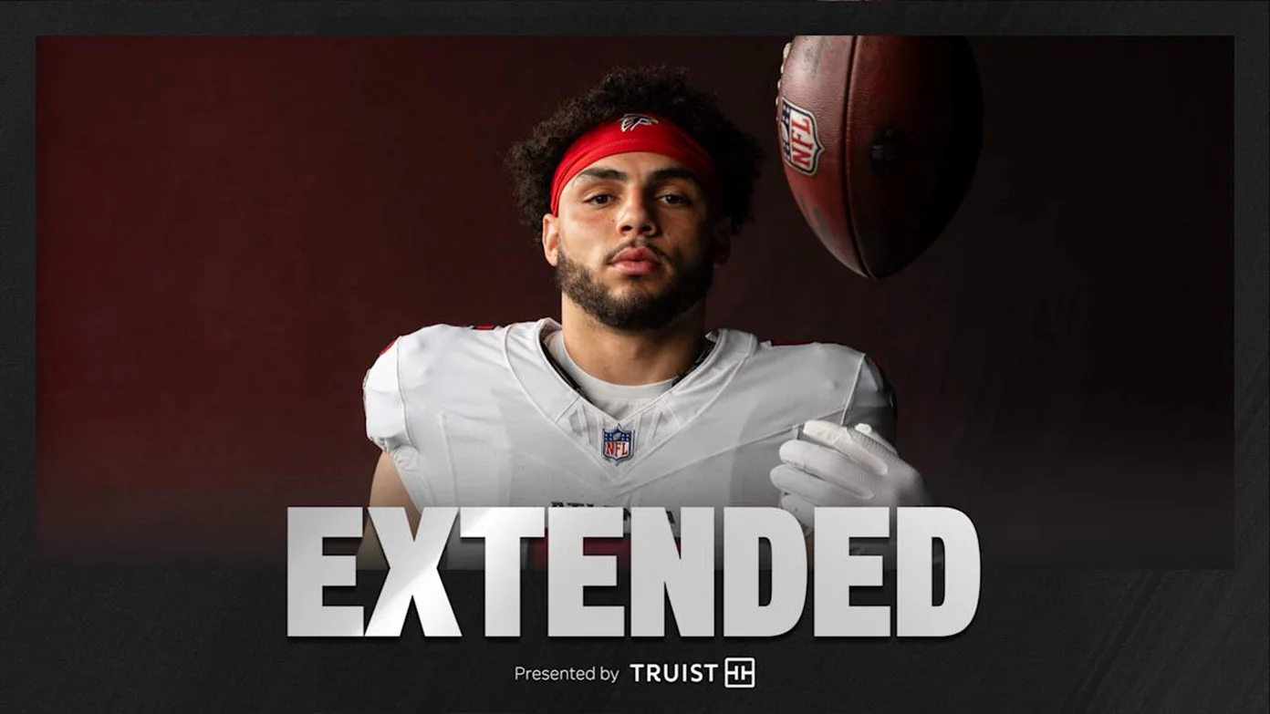 Drake London posing with football, 'Extended presented by Truist'
