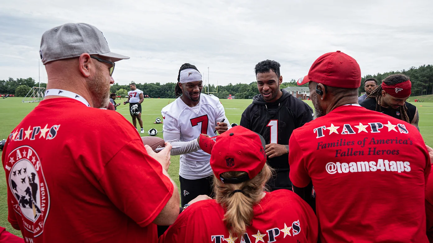 Atlanta Falcons players meeting with TAPS families.