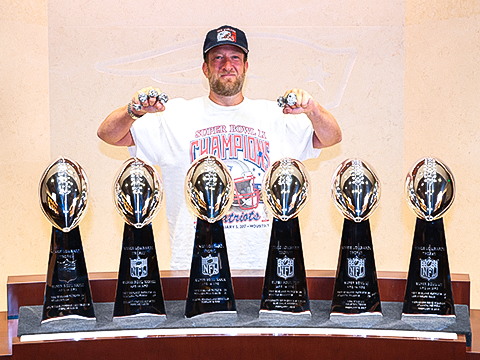 Dave Portnoy with Patriots Trophies.
