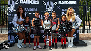 Raiders support Silver and Black Flag Football League teams