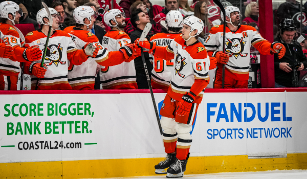Cutter Gauthier celebrates a goal with the bench at Honda Center
