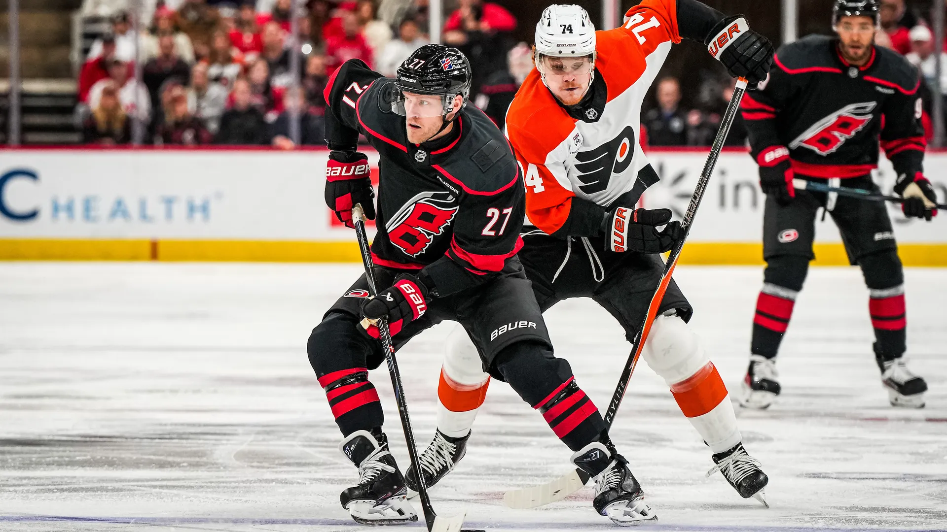 Nikolaj Ehlers and a Flyers player