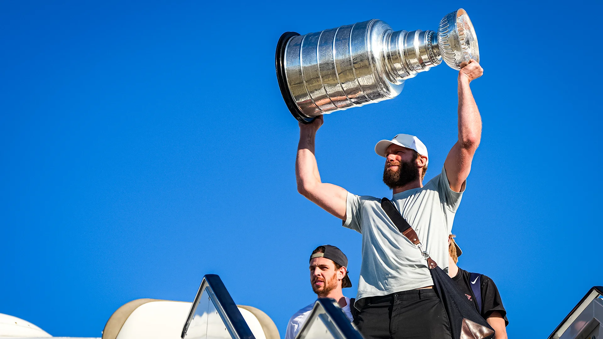 Jordan Staal deplaning with the Stanley Cup