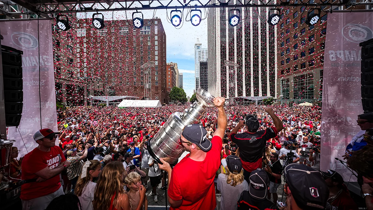 Jordan Staal lifting the Stanley Cup in front of the Championship Celebration crowd in Downtown Raleigh