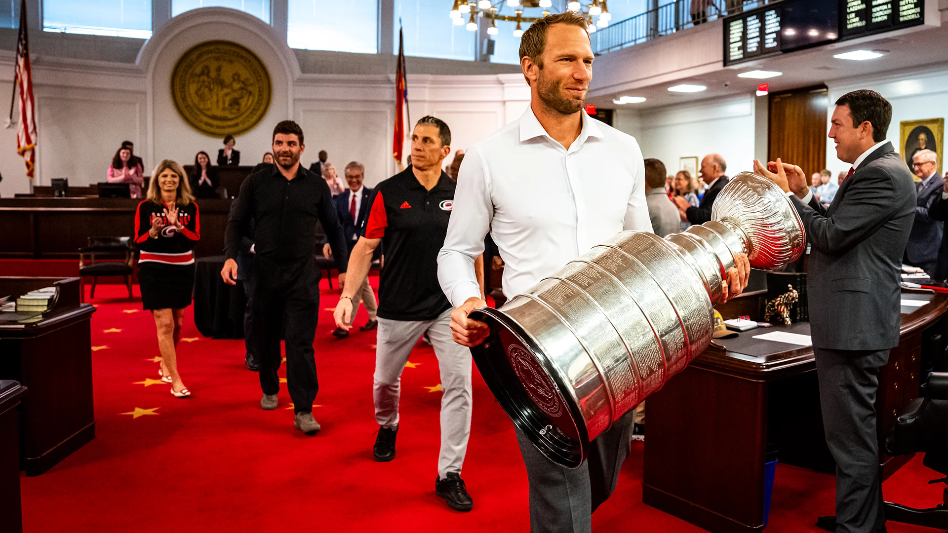 Jordan Staal carrying the Stanley Cup