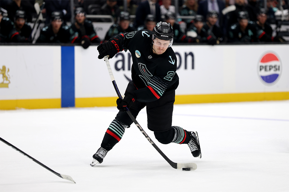 Eeli Tolvanen shooting a puck