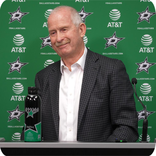 Jim Nill at the podium being interviewed