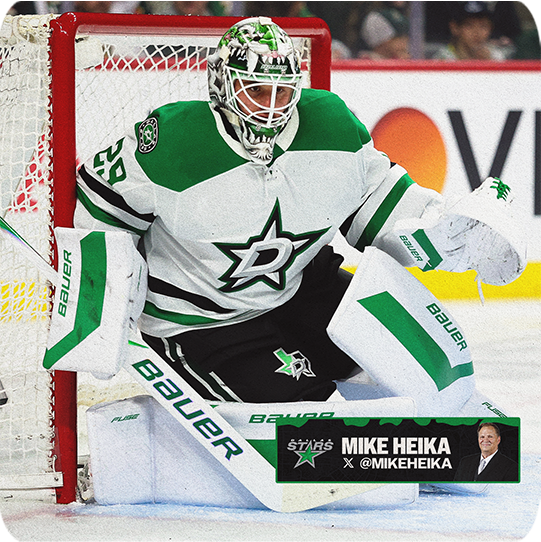 Jake Oettinger in an away jersey in net