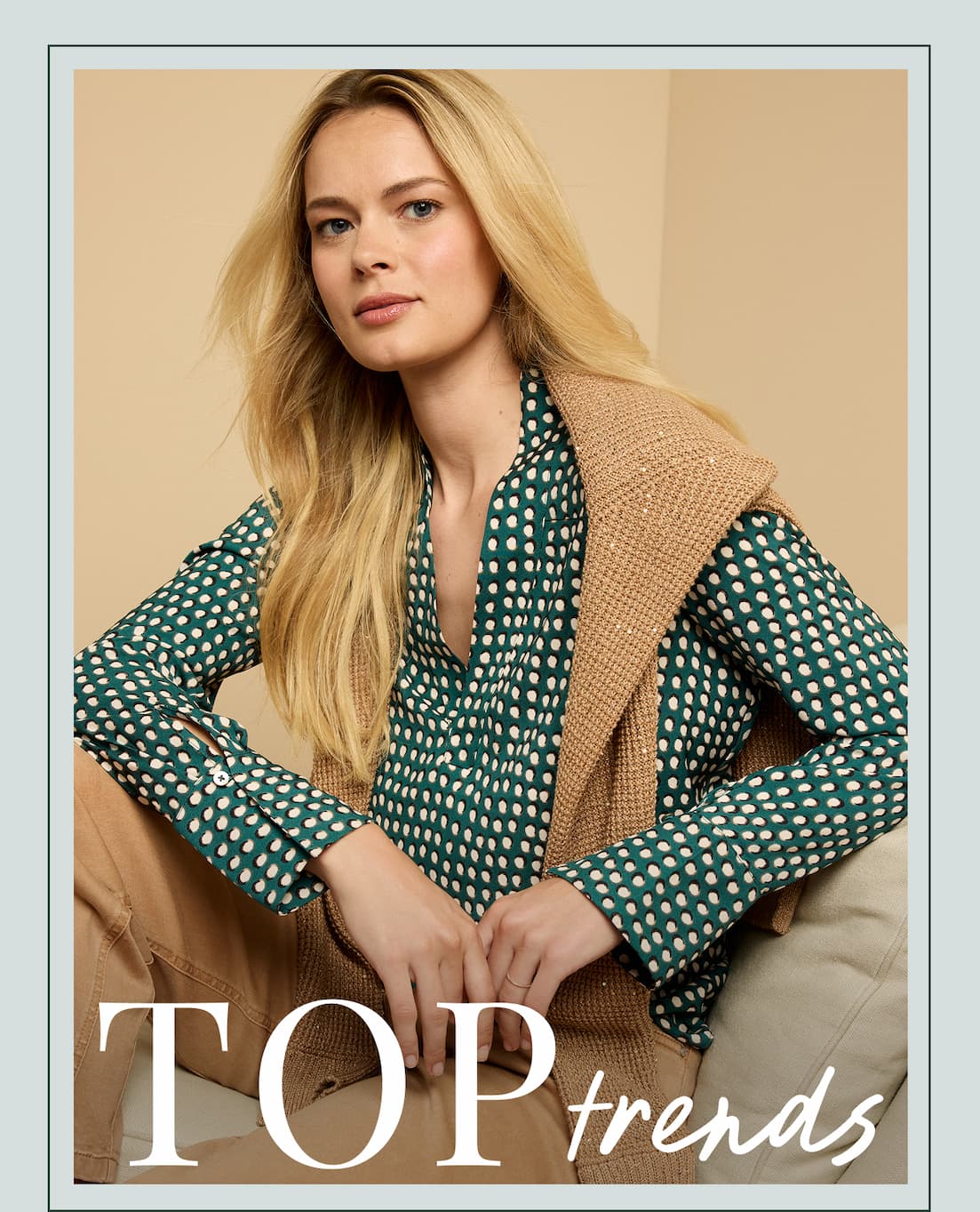 Woman wearing a green shirt with white dotted print