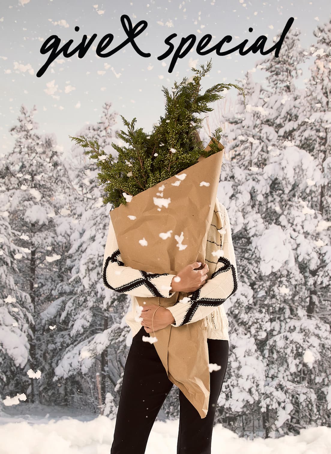 Give Special. Woman in a white sweater holding a wrapped gift.