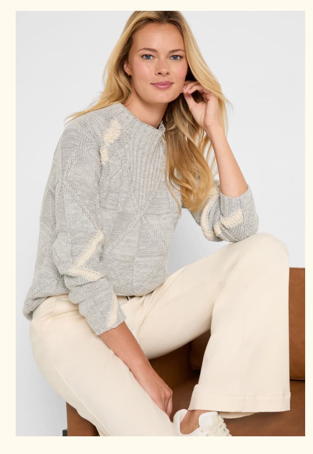 Woman wearing the Dashing Diamonds Sweater in Grey Multi