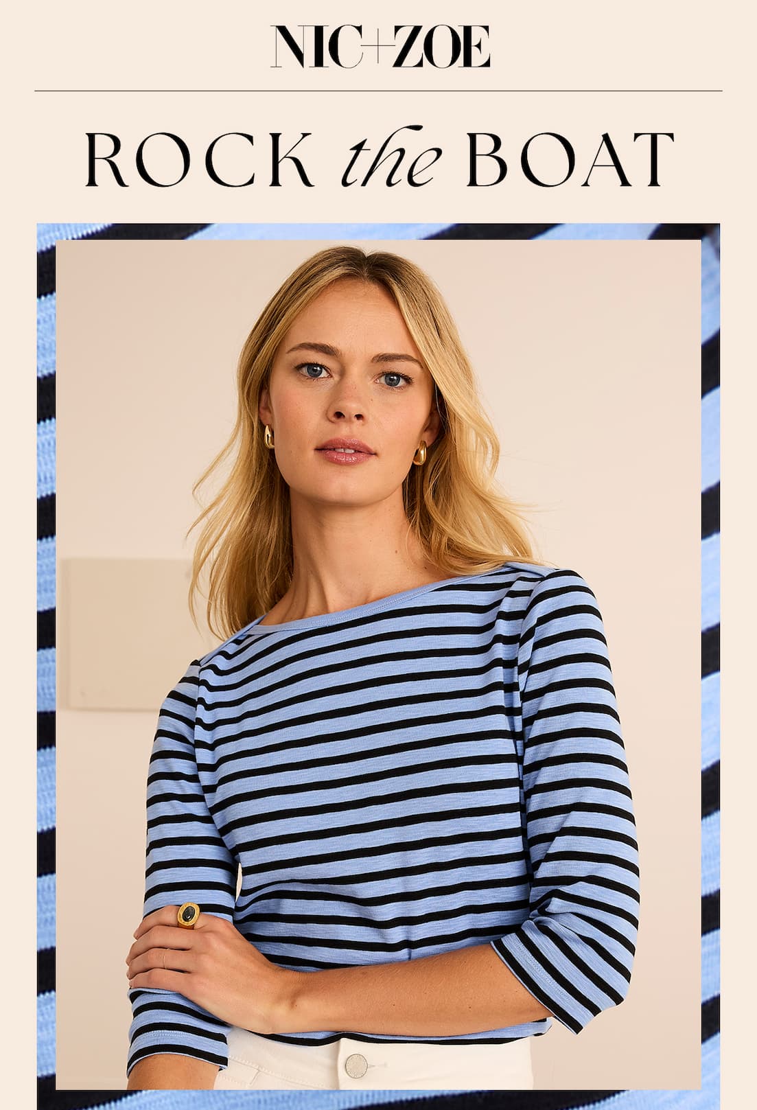 Woman wearing a blue striped 3/4 sleeve tee shirt