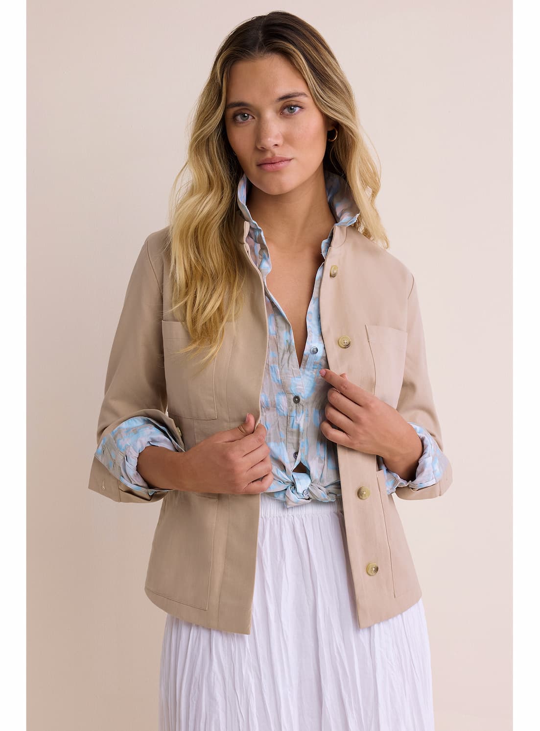 A lady wears the Cotton Twill Barn Jacket.