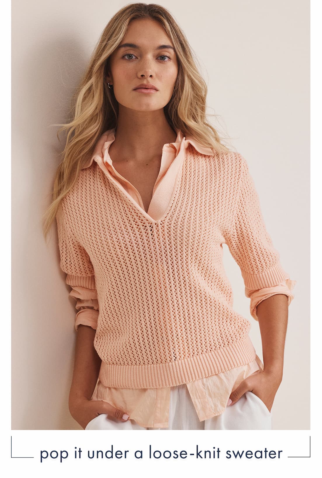 Pop it under a loose-knit sweater. The lady wearing the nz by nic+zoe Mesh Polo Sweater.