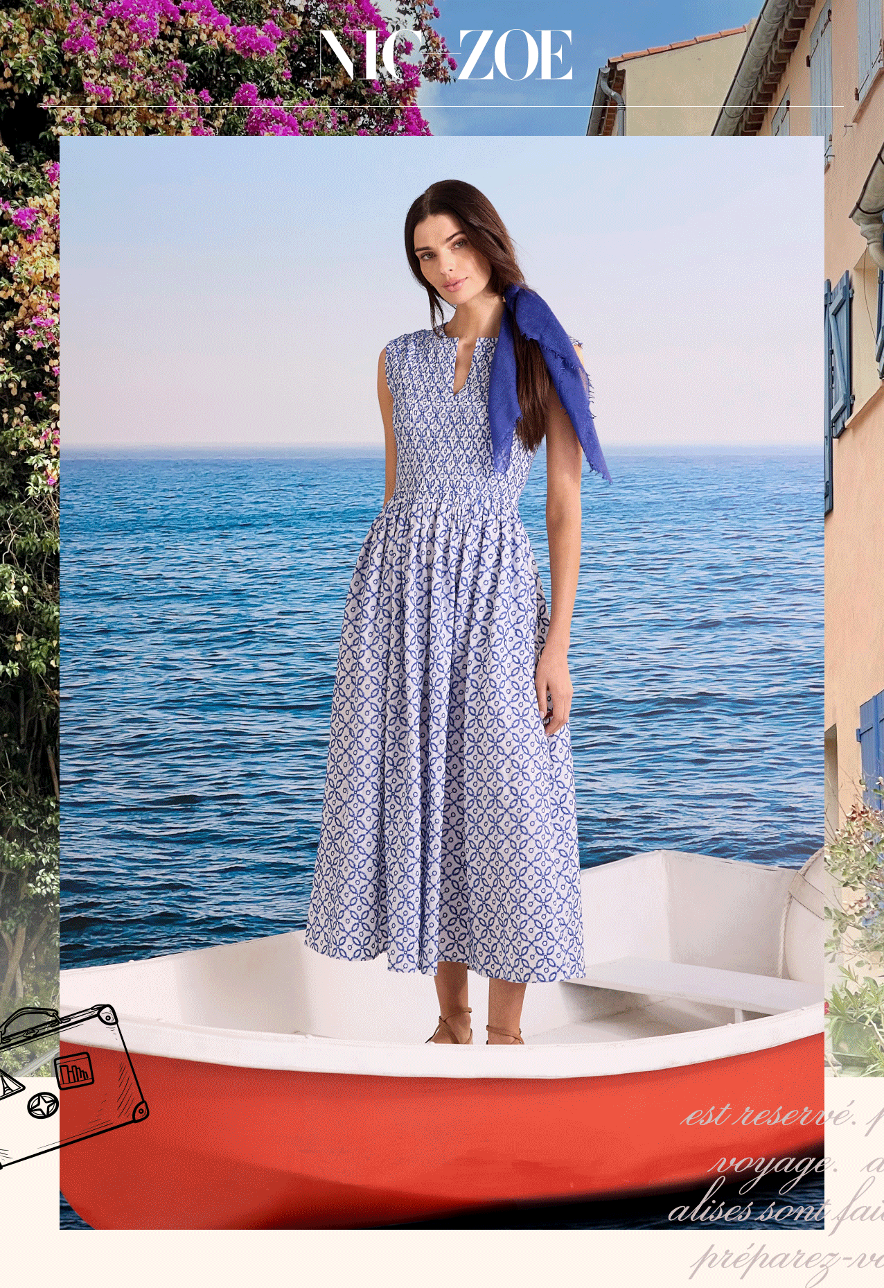 The GIF showcasing the lady wearing the Embroidered Tile Amelia Dress from the new collection. She is standing on the red boat.