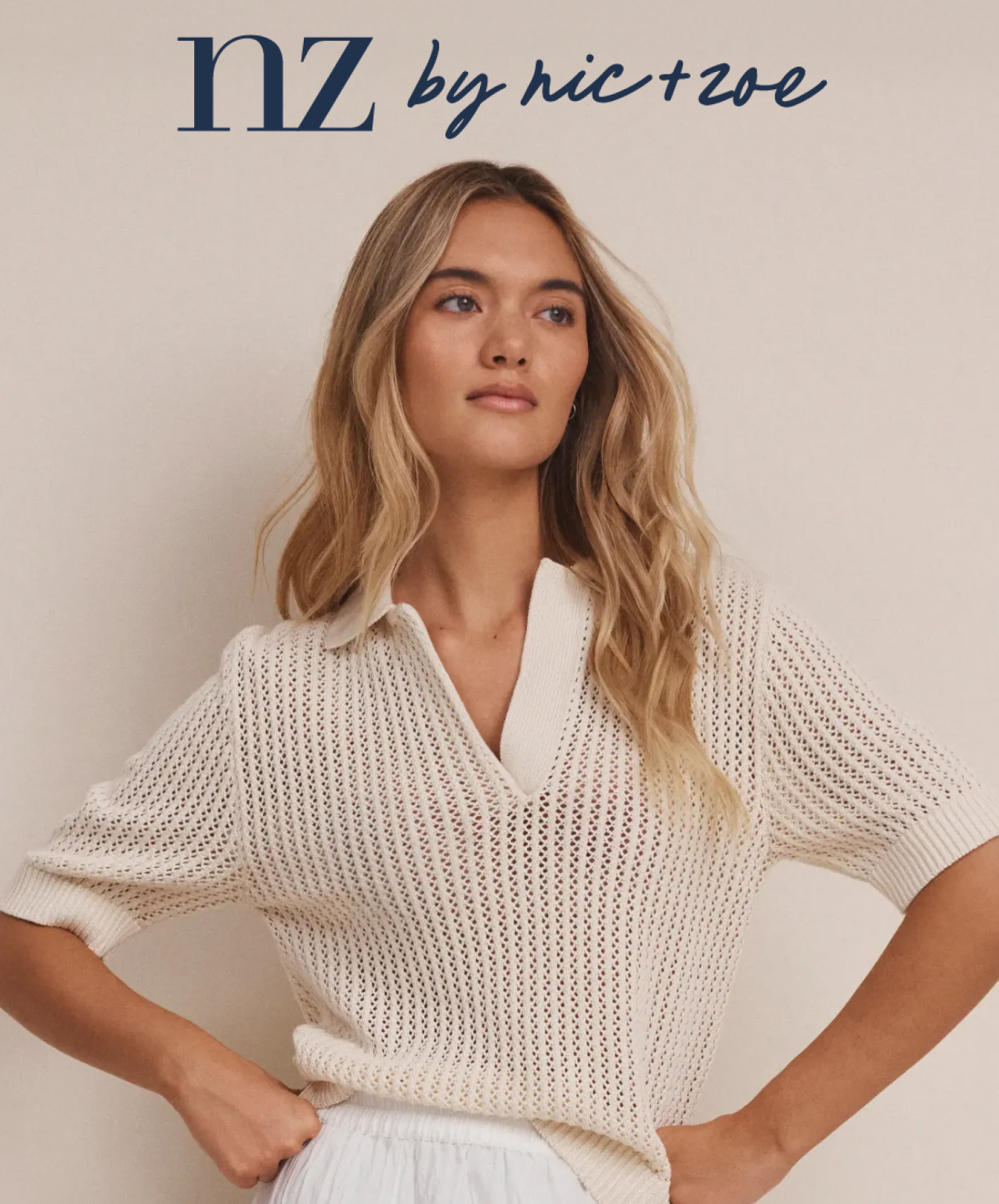 The lady wearing the nz by NIC+ZOE Mesh Polo Sweater in sand.