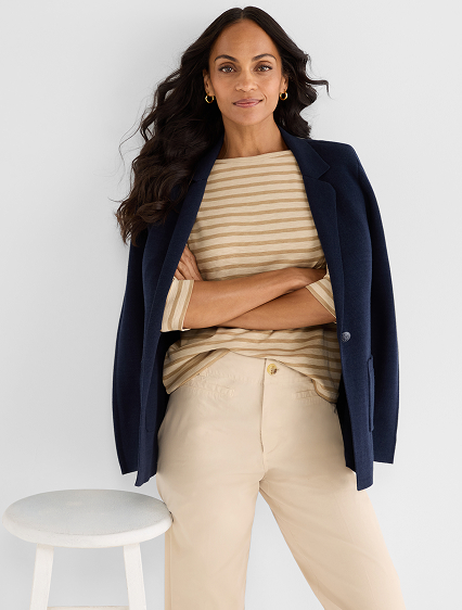 She wears the Elegant Knit Blazer.