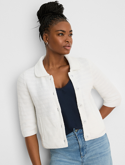 She wears the Elbow Sleeve Textured Knit Jacket