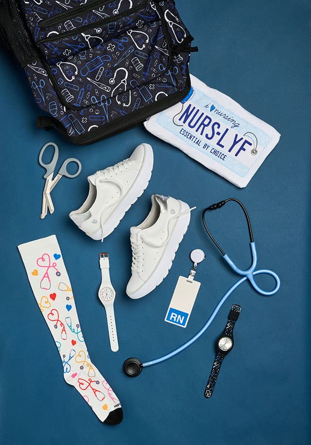 An assortment of Nurse Mates items surrounded by nursing equipment. Shop the stethoscope prints collection.