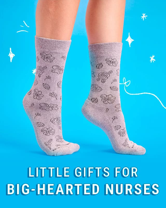 Little gifts for big-hearted nurses. A woman wearing the diabetic comfort crew in grey floral. Shop women's.