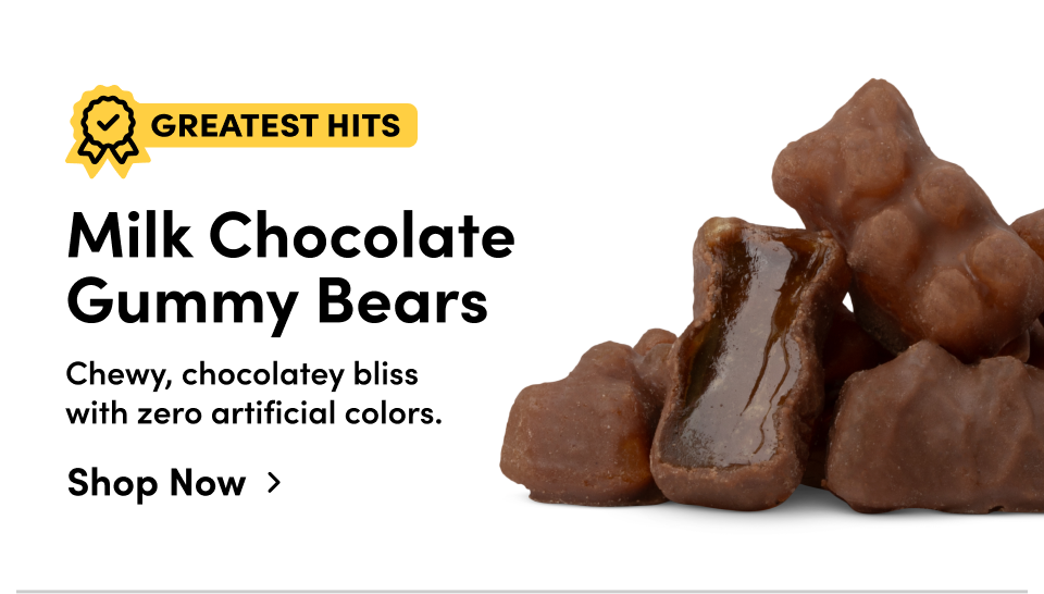 Greatest Hits | Milk chocolate gummy bears. Chewy, chocolatey bliss with zero artificial colors; Shop now>