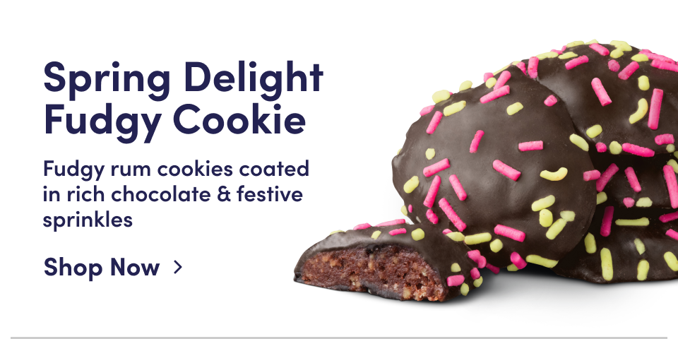 Spring Delight Fudgy Cookie | Fudgy rum cookies coated in rich chocolate & festive sprinkles; Shop Now
